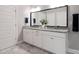 Modern bathroom with double vanity sinks, granite countertops, and large mirror at 4831 Looking Glass Trl, Denver, NC 28037