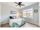 Bright and cozy bedroom with a comfortable bed, soft lighting, and a serene atmosphere at 4831 Looking Glass Trl, Denver, NC 28037