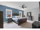 Comfortable main bedroom with a ceiling fan and natural light at 4831 Looking Glass Trl, Denver, NC 28037