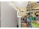 Functional laundry room with washer, dryer, storage shelves, and ample space for laundry tasks at 504 Ogden Dr, Gastonia, NC 28056