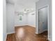 Spacious bedroom featuring wood floors, ceiling fan and plenty of natural light at 5211 Driftwood Dr, Davidson, NC 28036