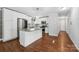 Spacious kitchen with large island, granite countertops, and stainless steel appliances at 5211 Driftwood Dr, Davidson, NC 28036