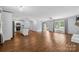 Spacious living area with open flow to the kitchen and front entry at 5211 Driftwood Dr, Davidson, NC 28036