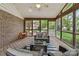 Cozy screened-in porch with furniture and views of backyard at 5211 Driftwood Dr, Davidson, NC 28036
