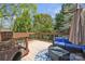Outdoor deck with wood railing, outdoor furniture, and lush greenery at 528 1St Nw Ave, Hickory, NC 28601