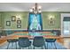 Bright dining room with green accents, hardwood floors, a chandelier, and wall sconces at 528 1St Nw Ave, Hickory, NC 28601