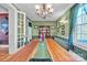 Inviting dining room with hardwood floors, decorative wallpaper and stylish chandelier at 528 1St Nw Ave, Hickory, NC 28601