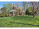 Beautiful brick home on an elevated lot with mature trees and a screened porch at 528 1St Nw Ave, Hickory, NC 28601