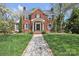 Charming brick home with a well-manicured lawn and inviting walkway, perfect for curb appeal at 528 1St Nw Ave, Hickory, NC 28601
