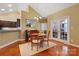 Bright dining area with chandelier lighting and hardwood floors at 6311 Ridge Path Ln, Charlotte, NC 28269