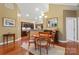 A pleasant dining area adjacent to the kitchen with hardwood floors at 6311 Ridge Path Ln, Charlotte, NC 28269