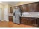 Spacious kitchen area with stainless steel appliances and ample storage at 6311 Ridge Path Ln, Charlotte, NC 28269