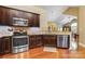 Well-equipped kitchen featuring stainless steel appliances and countertops at 6311 Ridge Path Ln, Charlotte, NC 28269