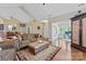 Inviting living room featuring hardwood floors and vaulted ceilings at 6311 Ridge Path Ln, Charlotte, NC 28269