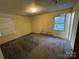 Bedroom featuring a window offering natural light and exterior views at 729 Aintree Rd, Charlotte, NC 28215
