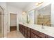 Bathroom with double vanity, walk-in shower, and ample cabinet storage at 740 Rosegate Dr, Gastonia, NC 28056