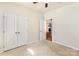 Bedroom featuring double closets and ceiling fan at 740 Rosegate Dr, Gastonia, NC 28056