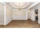 Dining room featuring decorative moldings and a chandelier at 740 Rosegate Dr, Gastonia, NC 28056