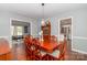 Dining room with classic wood furniture and neutral wall colors at 8807 Tree Haven Dr, Charlotte, NC 28270