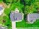 Aerial view of property showcasing well-manicured lawn and surrounding landscape at 9001 Fenwick Dr, Indian Trail, NC 28079