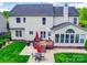 A backyard featuring a wood deck, patio, and outdoor dining furniture at 9001 Fenwick Dr, Indian Trail, NC 28079