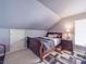 This bedroom features neutral walls, an area rug, and a wood-frame bed at 9001 Fenwick Dr, Indian Trail, NC 28079