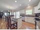 Kitchen with stainless appliances, granite countertops and an open floorplan at 9001 Fenwick Dr, Indian Trail, NC 28079