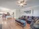 Spacious living room features an open floor plan, ceiling fan and hardwood floors at 9001 Fenwick Dr, Indian Trail, NC 28079