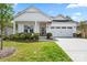 Charming home with a well-maintained lawn and a welcoming front porch at 9077 Myrna Dr, Gastonia, NC 28056