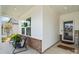 Inviting covered front porch with comfortable seating and decor at 9077 Myrna Dr, Gastonia, NC 28056