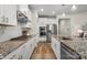 Well-equipped kitchen featuring granite countertops, stainless steel appliances, and a functional center island at 9077 Myrna Dr, Gastonia, NC 28056