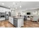 Modern kitchen with stainless steel appliances, granite countertops, and an island with seating at 9077 Myrna Dr, Gastonia, NC 28056