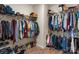 Spacious walk-in closet with ample storage and shelving for shoes and clothes at 9077 Myrna Dr, Gastonia, NC 28056