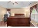 Spacious main bedroom boasts hardwood floors, a trey ceiling, and lots of natural lighting at 909 Jordans Pond Ln, Charlotte, NC 28214