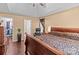 Spacious main bedroom has hardwood floors, a trey ceiling, a walk-in closet and ensuite bathroom at 909 Jordans Pond Ln, Charlotte, NC 28214