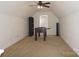 Bonus room features a ceiling fan and a foosball table for entertainment at 9109 Foggy Meadow Rd, Charlotte, NC 28269