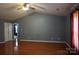 Spacious living room with hardwood floors, vaulted ceiling, and access to other rooms at 9109 Foggy Meadow Rd, Charlotte, NC 28269