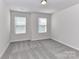 This is a lovely bedroom with plush carpeting and lots of natural light at 9134 Northfield Crossing Dr, Charlotte, NC 28269