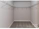 Walk-in closet with wire shelving and neutral carpet at 9134 Northfield Crossing Dr, Charlotte, NC 28269