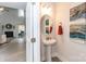 Stylish powder room with pedestal sink and decorative art at 1015 Gardenia Dr # 52, Mt Ulla, NC 28125