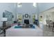 Spacious living room featuring fireplace, large windows, and modern decor at 1015 Gardenia Dr # 52, Mt Ulla, NC 28125