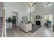 Bright open living area with fireplace, high ceiling, and contemporary decor at 1015 Gardenia Dr # 52, Mt Ulla, NC 28125