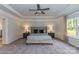 Serene main bedroom features a trey ceiling, neutral walls, and cozy carpeting at 1015 Gardenia Dr # 52, Mt Ulla, NC 28125