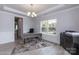 Home office with a desk, a dark wood console, overhead lighting and neutral walls with white trim at 1015 Gardenia Dr # 52, Mt Ulla, NC 28125