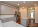 Modern kitchen featuring grey cabinets, granite countertops, and stainless steel refrigerator at 10209 Meeting House Nw Dr, Huntersville, NC 28078
