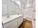 Bathroom featuring a double sink vanity, large mirror, and a shower-tub combo at 1035 Gardenia Dr # 51, Mt Ulla, NC 28125