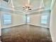 Large bedroom featuring three windows allowing for natural light at 1035 Gardenia Dr # 51, Mt Ulla, NC 28125