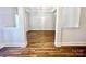 Spacious dining room featuring hardwood floors and neutral paint, perfect for Gathering gatherings at 1035 Gardenia Dr # 51, Mt Ulla, NC 28125
