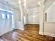 Welcoming foyer with hardwood floors, elegant lighting, and open access to living spaces at 1035 Gardenia Dr # 51, Mt Ulla, NC 28125