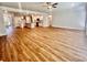 Spacious living room featuring hardwood floors, an open floor plan, and bright lighting at 1035 Gardenia Dr # 51, Mt Ulla, NC 28125